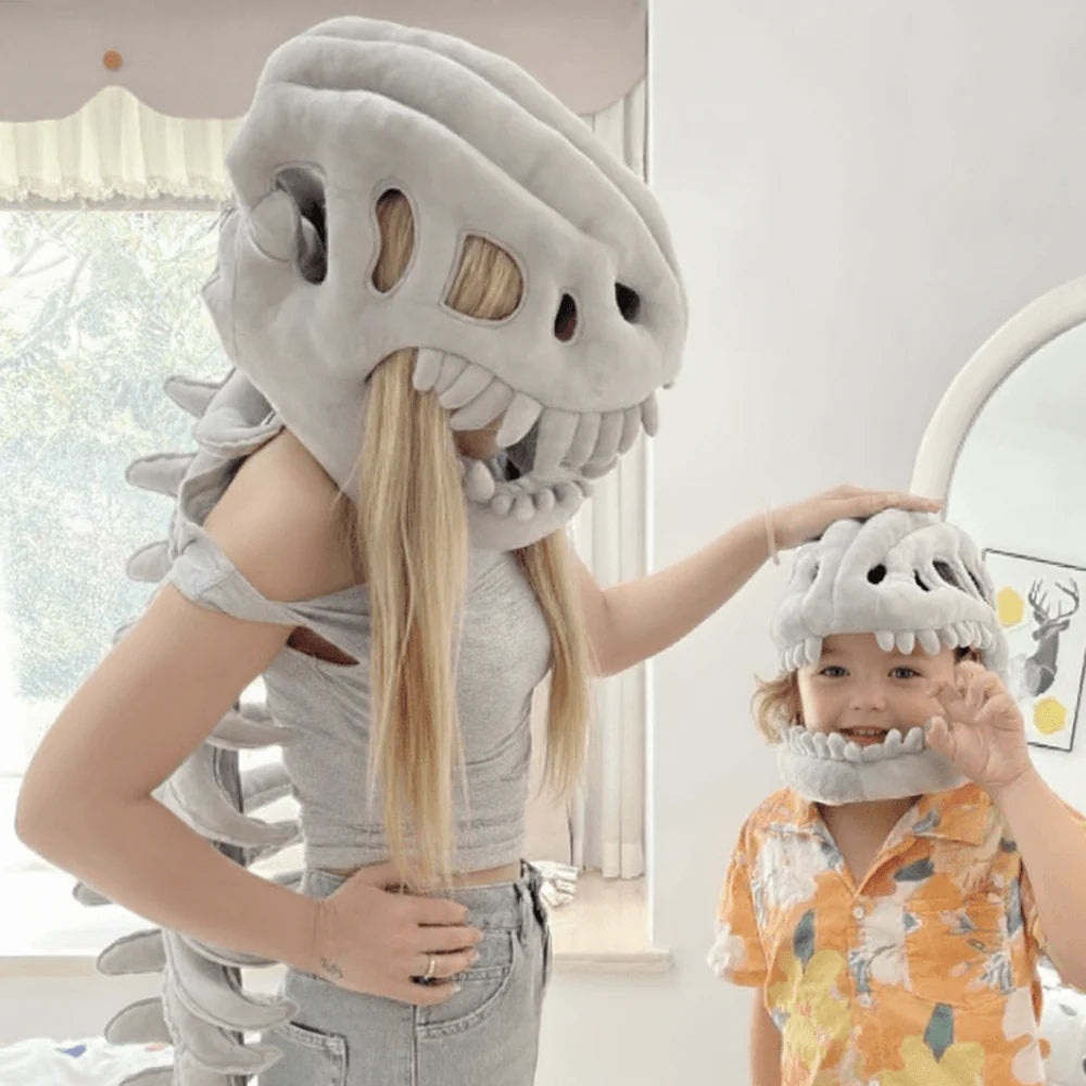 Mum and son wearing DinoRoar costumes together at home in the bedroom